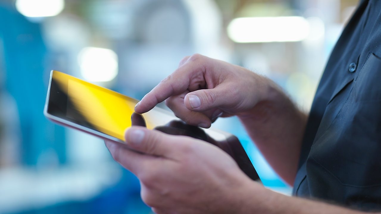 Engineer using digital tablet