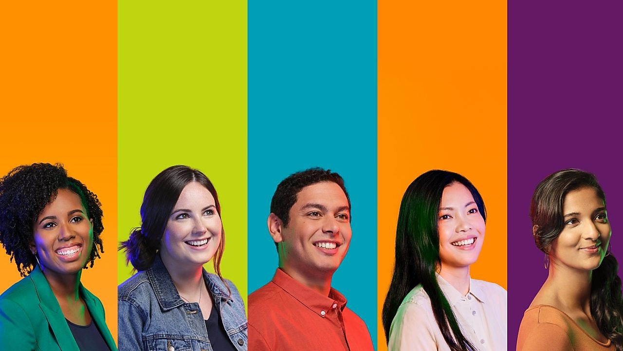 Five smiling Shell employees looking to the future