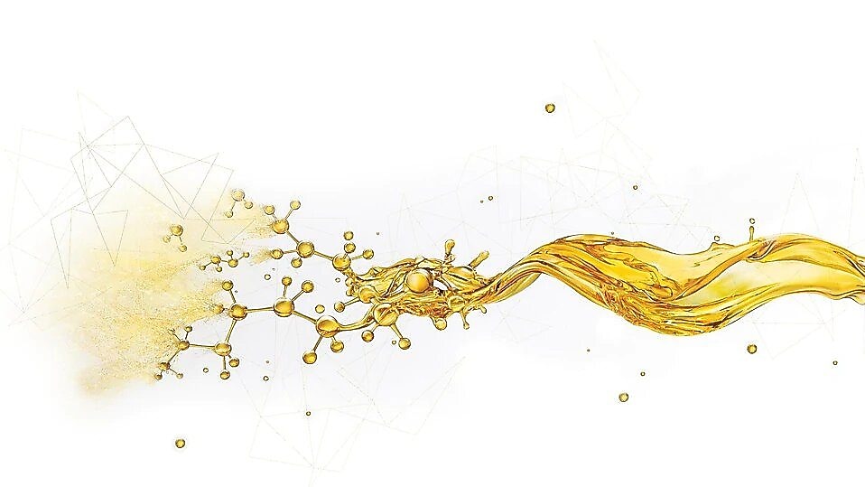 Schizzo d'olio che si divide in piccole gocce