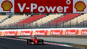 Ferrari Formula 1 driver Kimi Raikkonen racing his Ferrari SF15-T car