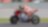 Sportsman riding motor bike