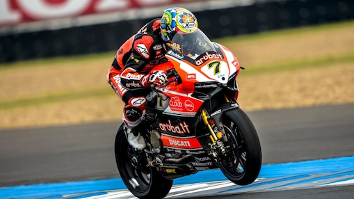 Sportman driving bike and performing stunt