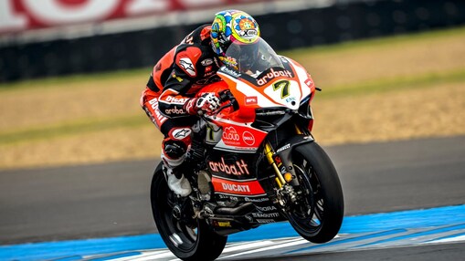 Sportman driving bike and performing stunt