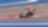 Ducati motorcycle racing around a corner of a racing track