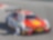 Pilota BMW motorsport appoggiato a un'auto che utilizza una formulazione di olio Shell Helix su misura.