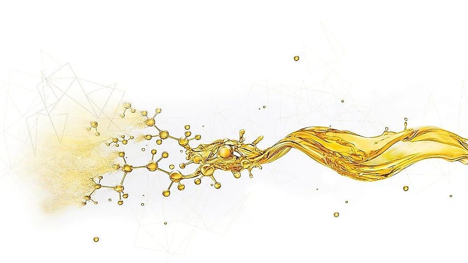 Schizzo d'olio che si divide in piccole gocce