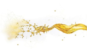 Schizzo d'olio che si divide in piccole gocce