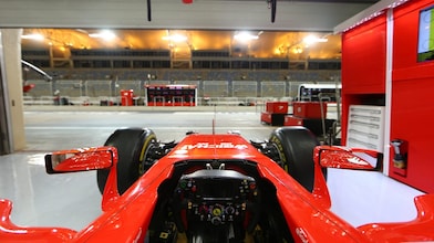Scuderia Ferrari F1 car in garage